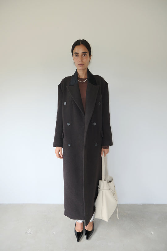 long chocolate coat enormous